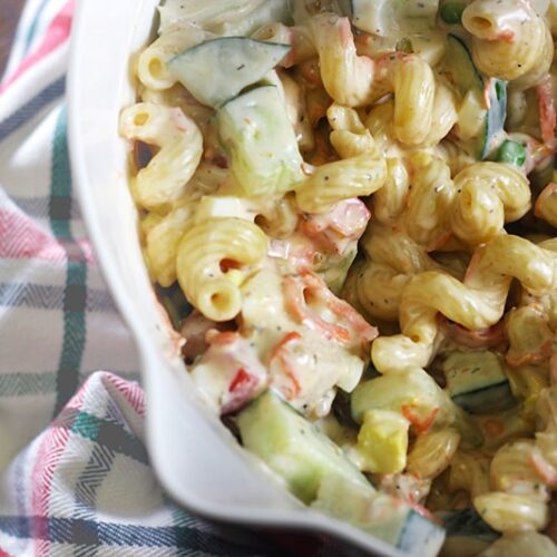 Chicken Cobb Pasta Salad 10 | Kenya Rae Chicken Cobb Pasta Salad in bowl on table with plaid napkin