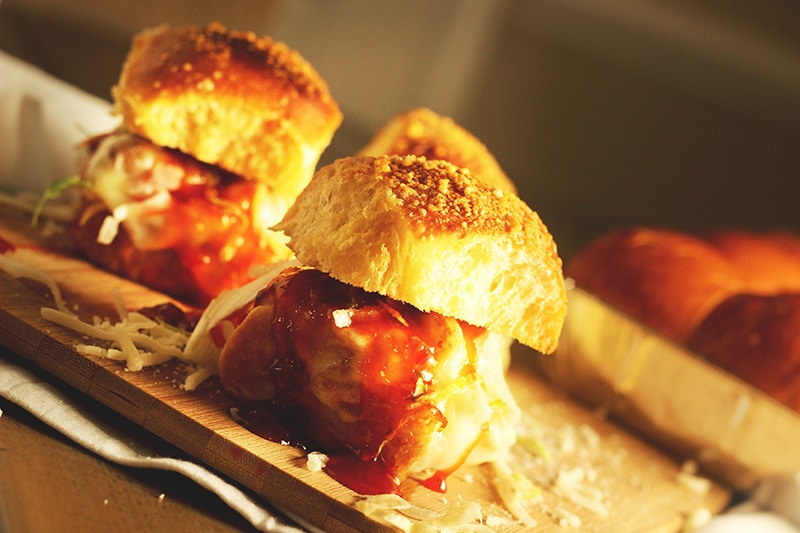 sweet chili chicken sliders on table