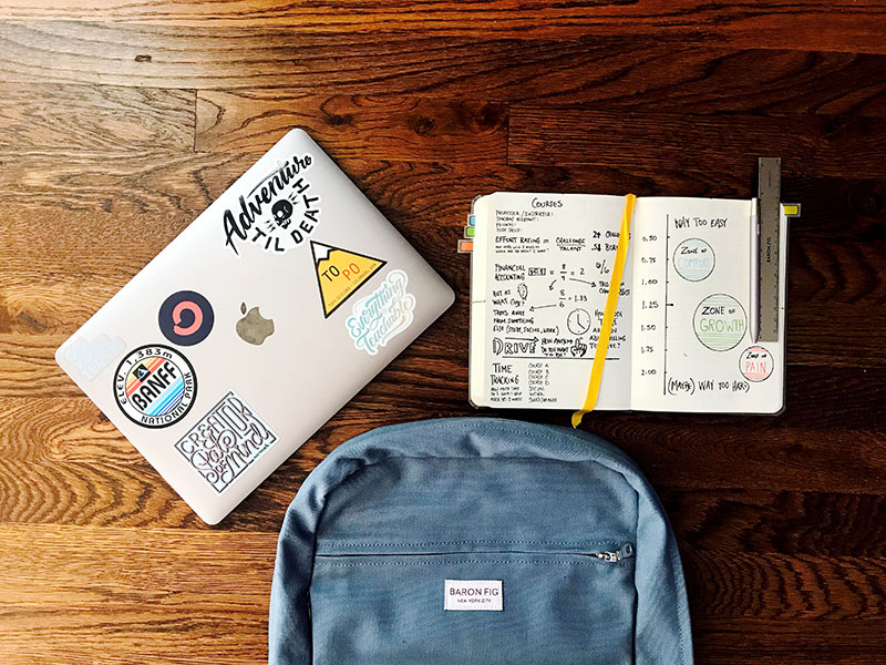 computer bookbag and notebook