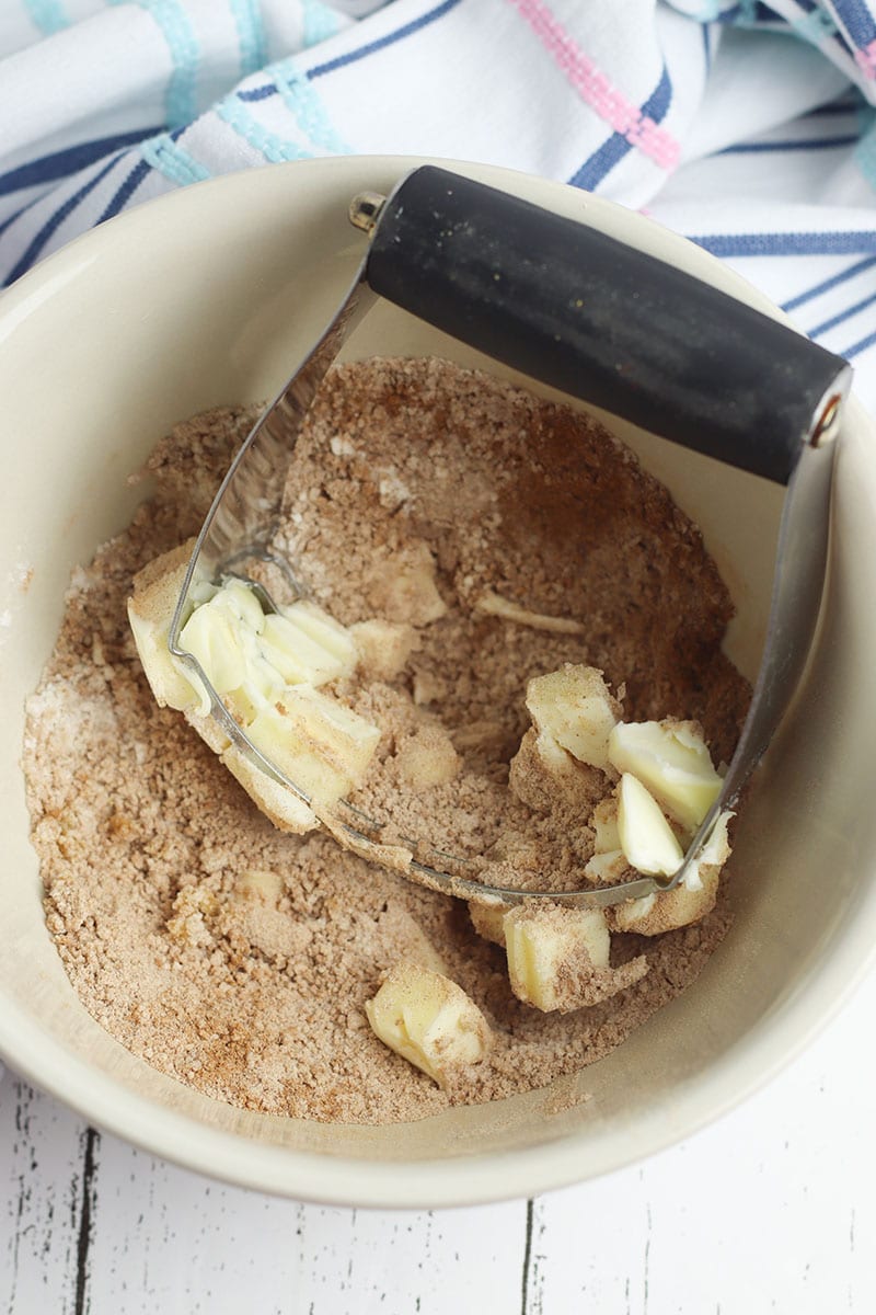 mixing brown sugar with butter and flour