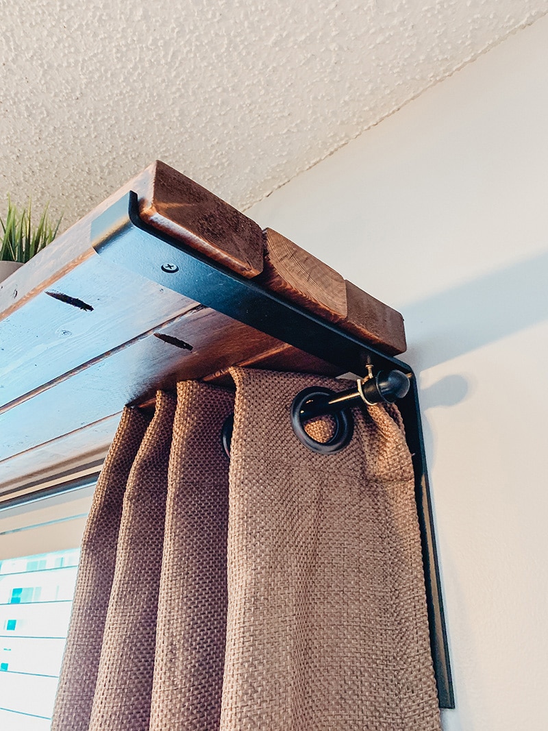 up close of curtain rod shelf