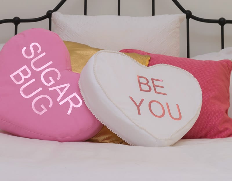 conversation-heart-pillows-on-bed.jpg | Kenya Rae