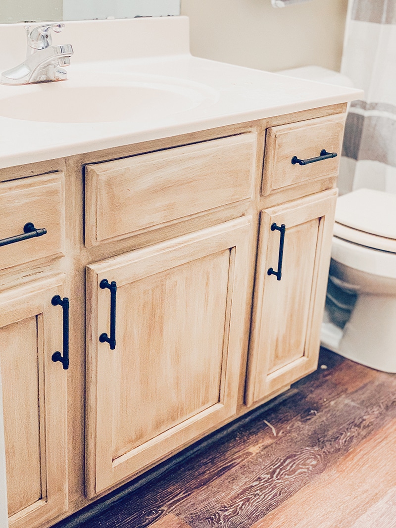 rustoleum updated bathroom vanity with chiffon cream chalk paint and aged bronze glaze