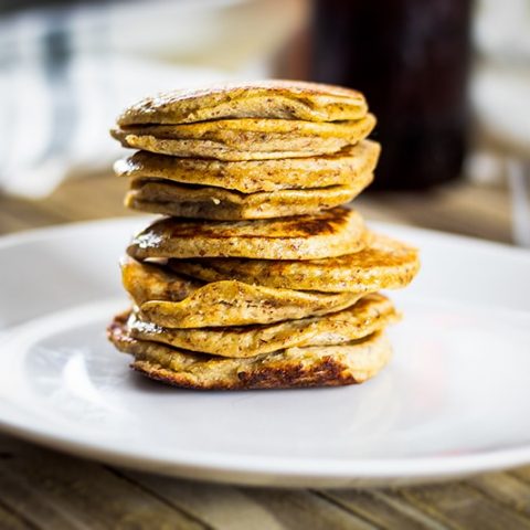 A stack of Almond Flour Pancakes on a white plate