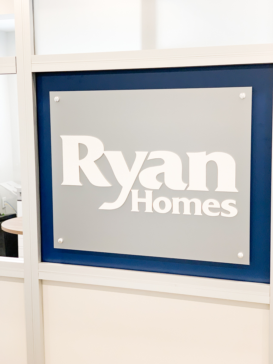 Ryan homes sign in model home office