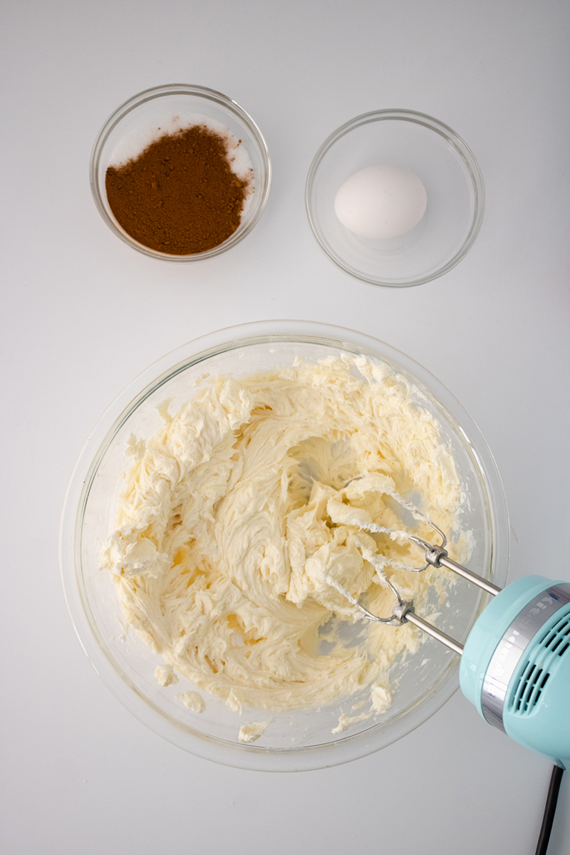 Mixing cheesecake ingredients together