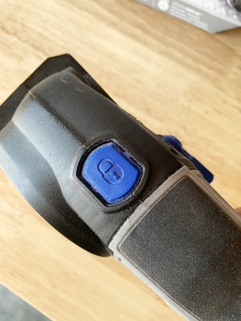 the lock button on the sawmax